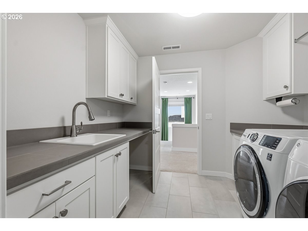 16275 Southwest Jade View Way Beaverton, OR 97007 - Photo 21 of 34 Laundry