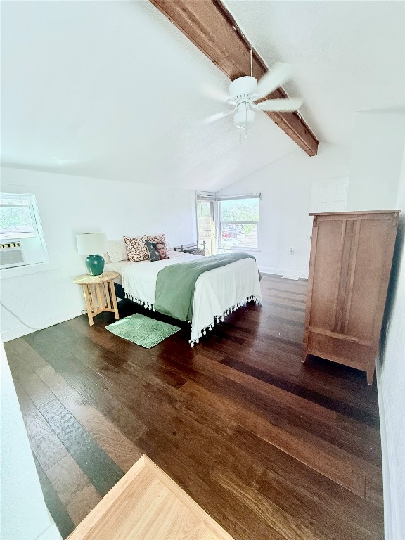 6027 Bluebell Circle Austin, TX 78741 - Photo 14 of 26 a spacious bedroom with a bed and wooden floor