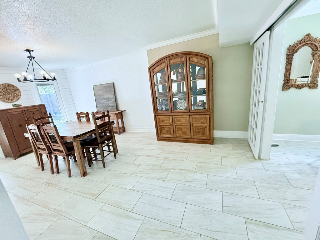 6027 Bluebell Circle Austin, TX 78741 - Photo 7 of 26 a view of a livingroom with furniture and entryway