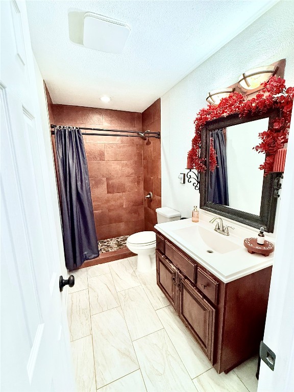 6027 Bluebell Circle Austin, TX 78741 - Photo 8 of 26 a bathroom with a sink vanity mirror and toilet