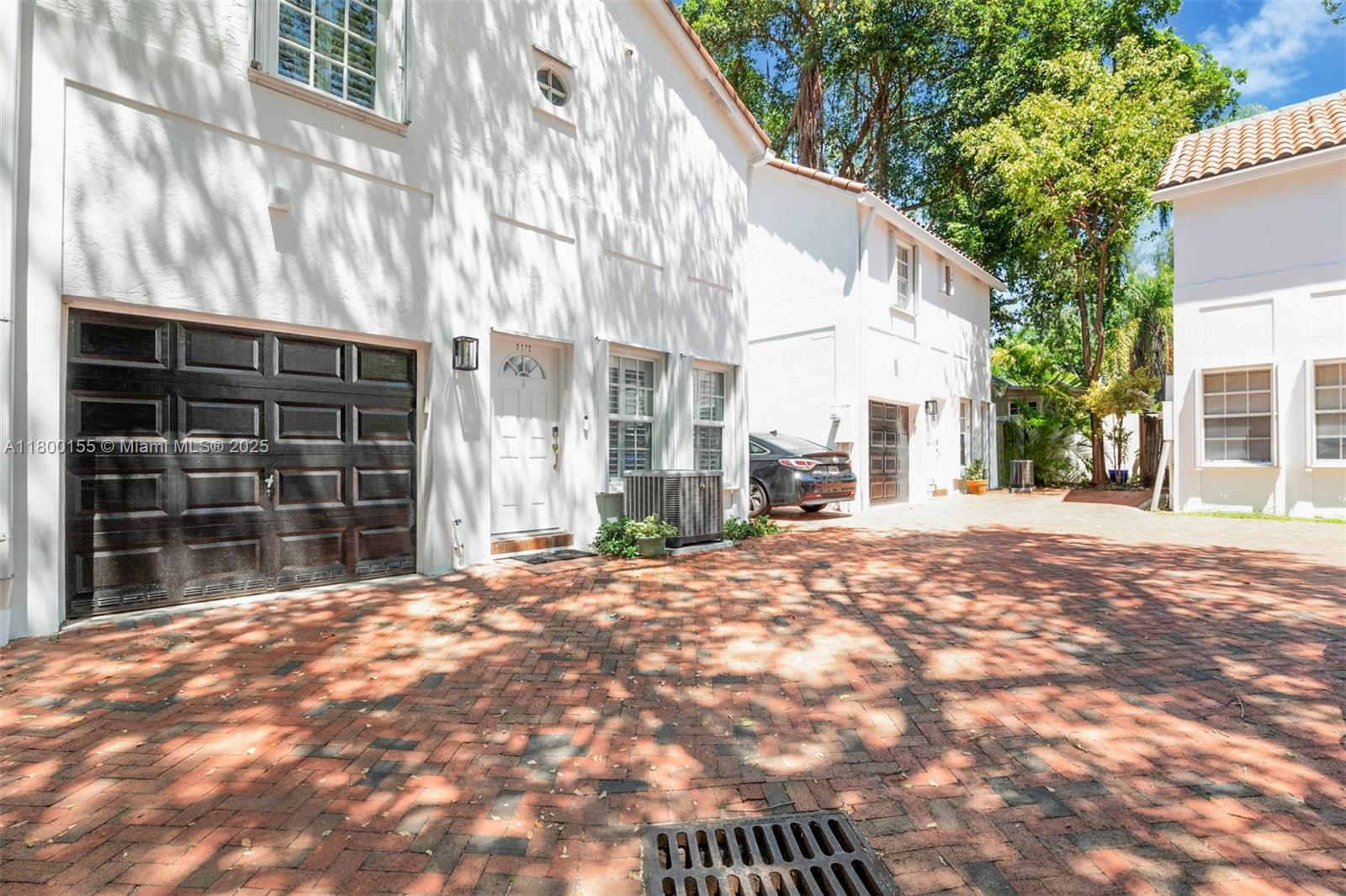 3172 Virginia Street Coconut Grove, FL 33133 - Photo 2 of 3 a view of a house with a yard