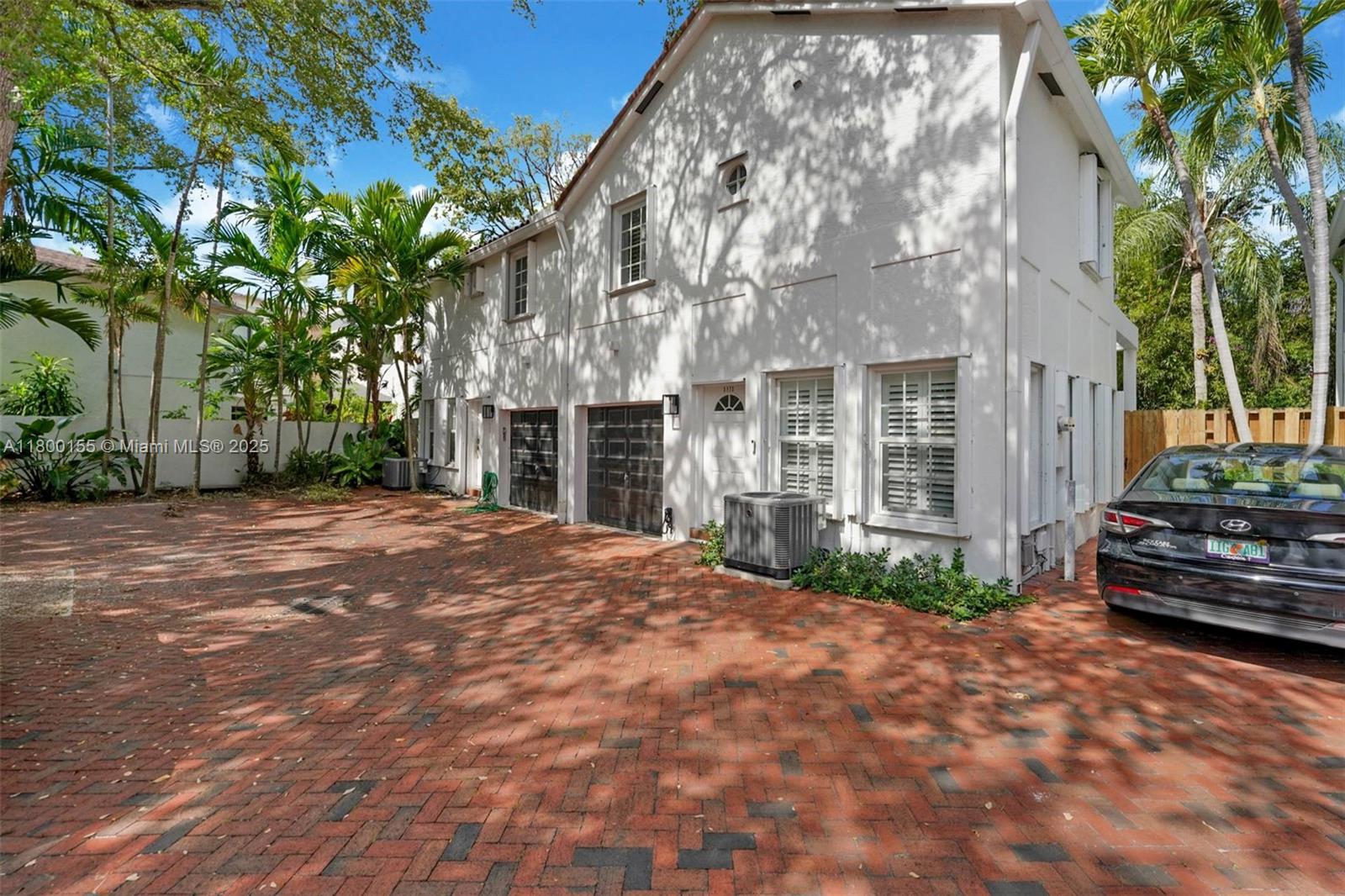 3172 Virginia Street Coconut Grove, FL 33133 - Photo 3 of 3 a view of a house with a yard