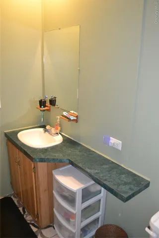 a bedroom with bed and a window