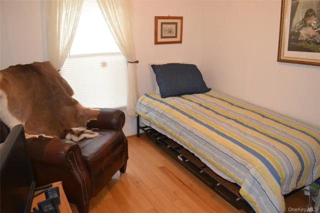 a bedroom with furniture and a bed