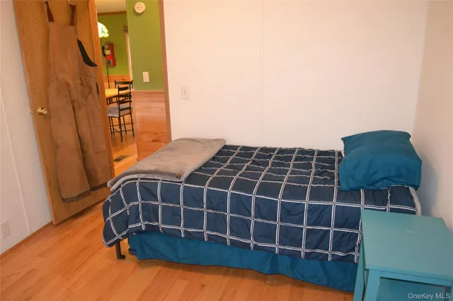 a view of an empty room and a window