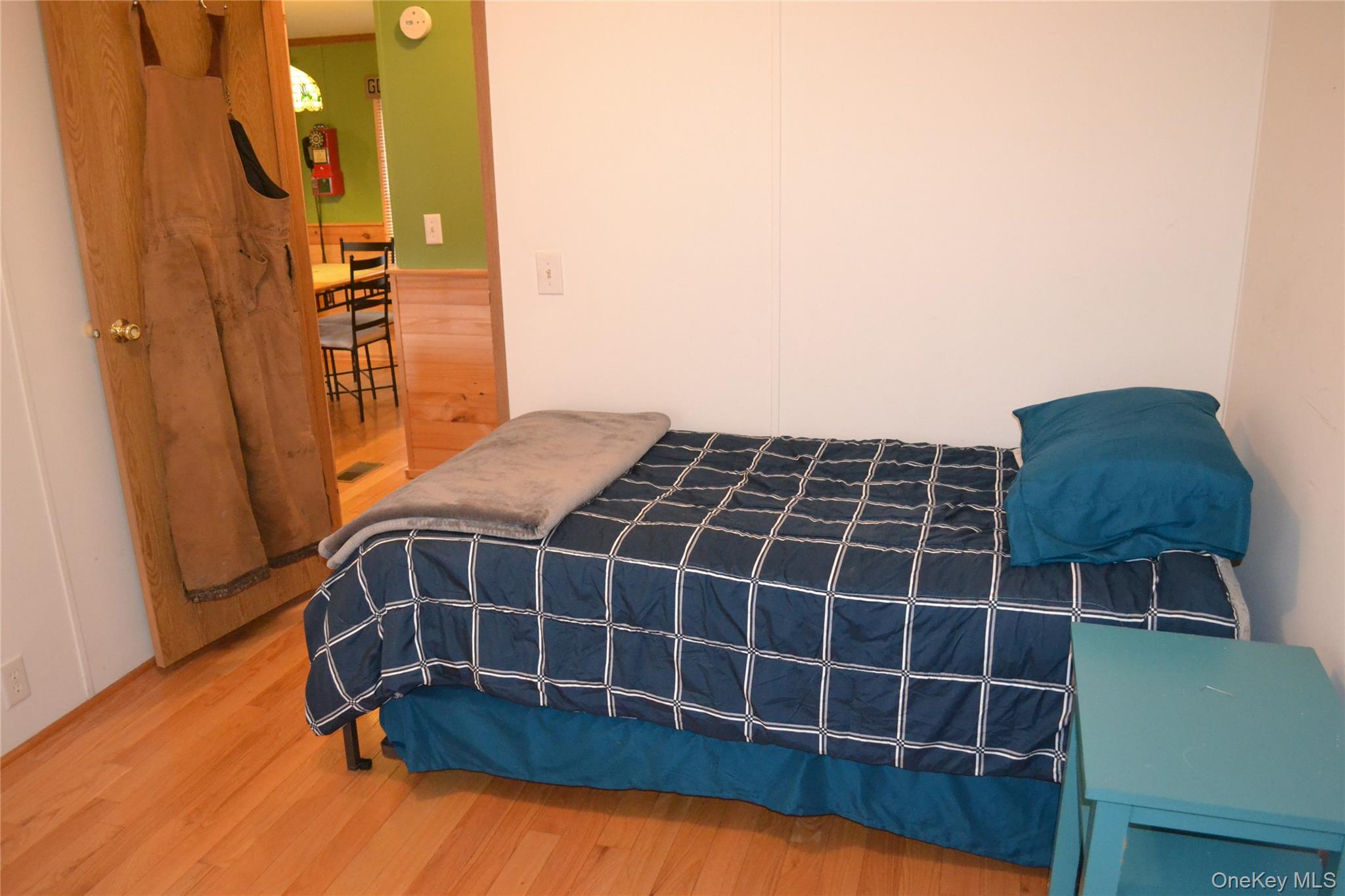 144 Bonnie Brook Road Roscoe, NY 12776 - Photo 18 of 34 a view of a room with wooden floor and windows