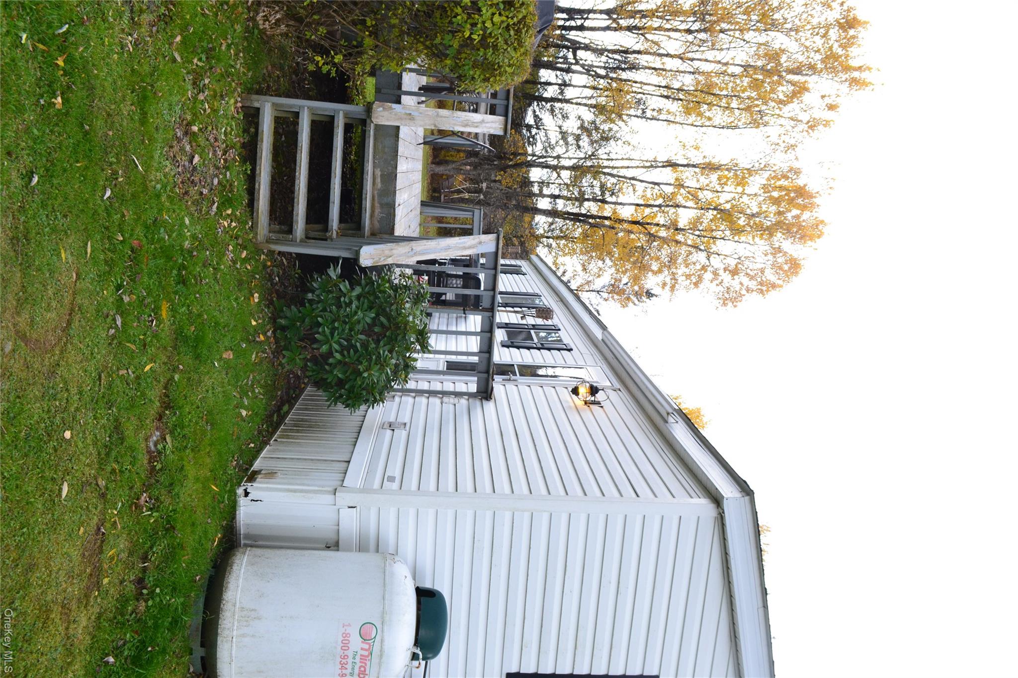 144 Bonnie Brook Road Roscoe, NY 12776 - Photo 6 of 34 a view of a house with a yard