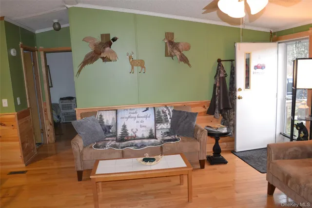 a view of workspace with wooden floor