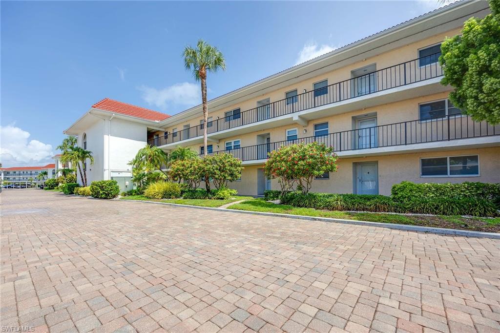 45 High Point Circle South, Unit 303 Naples, FL 34103 - Photo 1 of 22