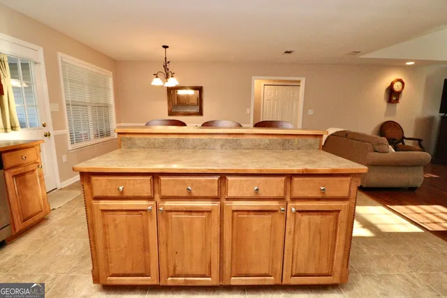 a room with wooden cabinets