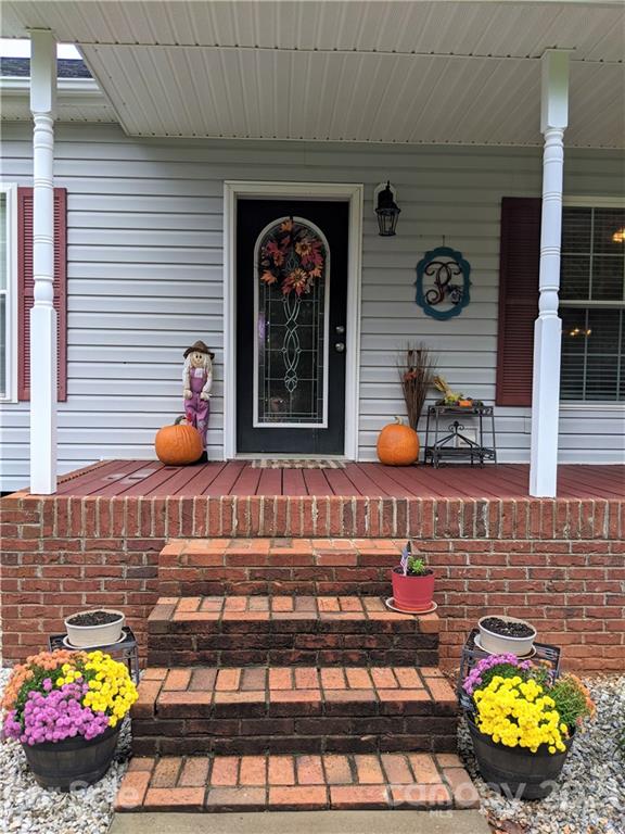 162 Robinson Creek Road Bostic, NC 28018 - Photo 2 of 35 a front view of a house with outdoor seating