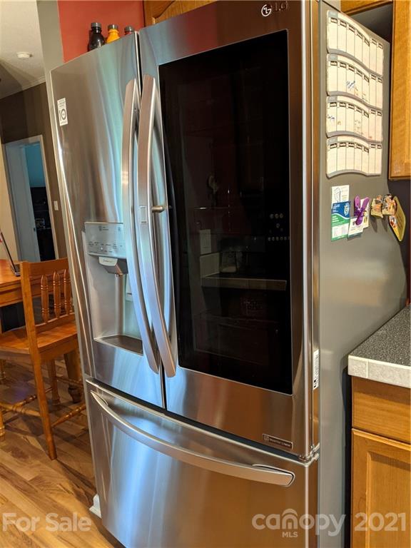 162 Robinson Creek Road Bostic, NC 28018 - Photo 12 of 35 a close view of refrigerator and washing machine