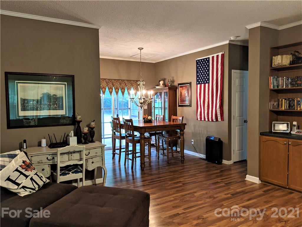 162 Robinson Creek Road Bostic, NC 28018 - Photo 13 of 35 a living room with furniture and a flat screen tv