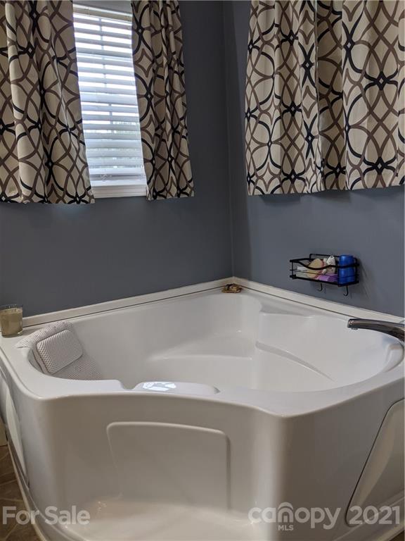 162 Robinson Creek Road Bostic, NC 28018 - Photo 17 of 35 a bathroom with a bathtub