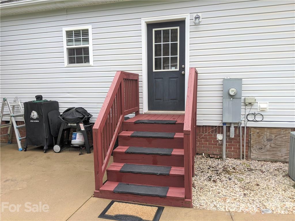 162 Robinson Creek Road Bostic, NC 28018 - Photo 25 of 35 a view of a house with wooden deck