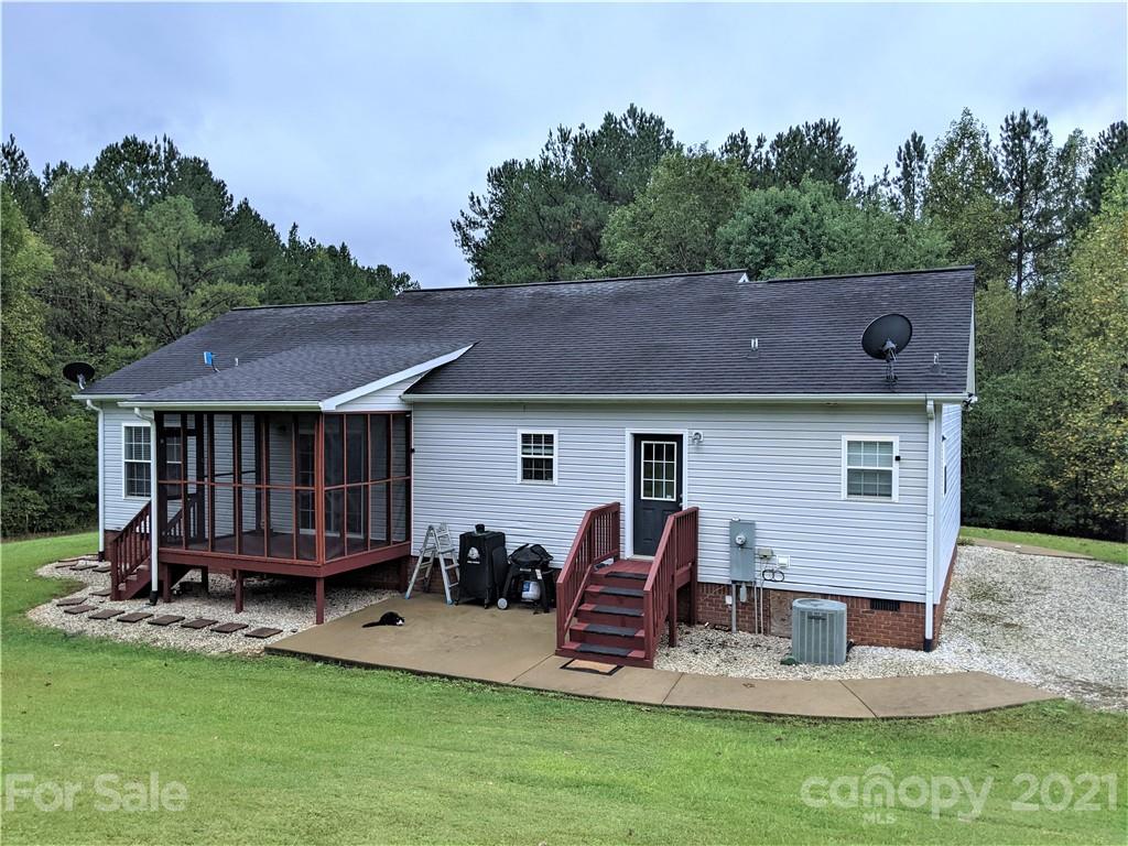 162 Robinson Creek Road Bostic, NC 28018 - Photo 26 of 35 a view of a house with a yard porch and sitting area