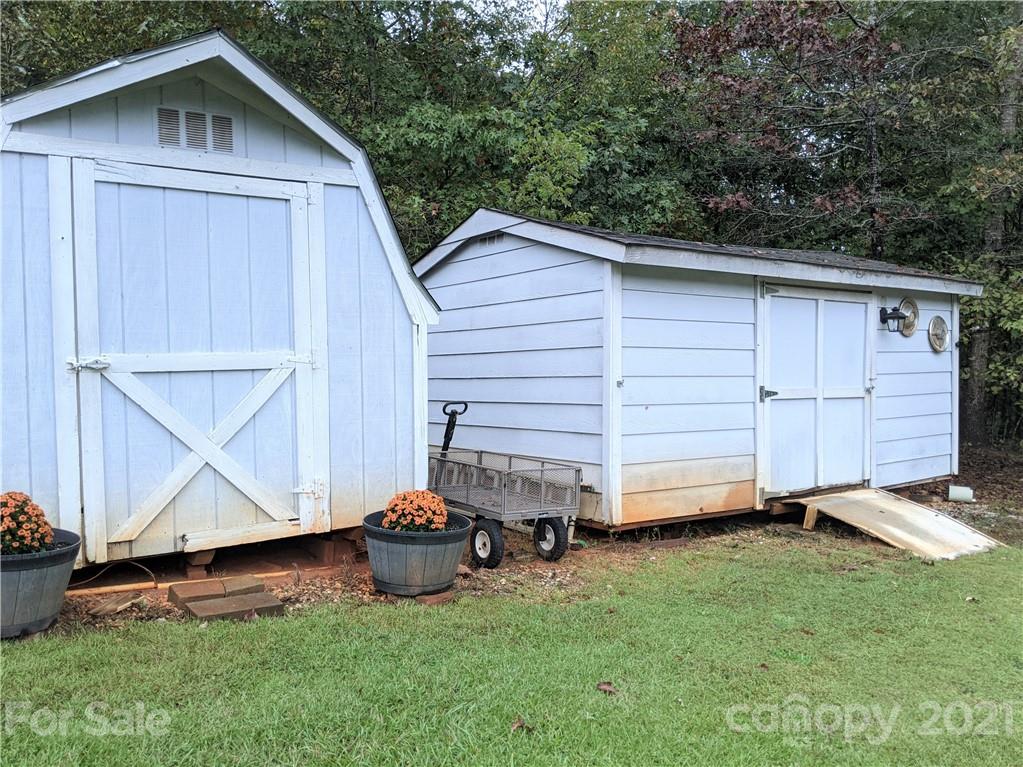 162 Robinson Creek Road Bostic, NC 28018 - Photo 29 of 35 a view of backyard with tub and deck
