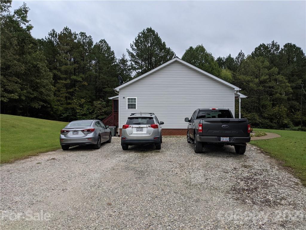 162 Robinson Creek Road Bostic, NC 28018 - Photo 35 of 35 a view of a car parked in the yard