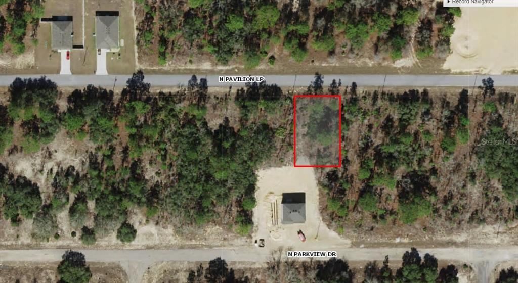 6787 North Pavilion Loop Citrus Springs, FL 34433 - Photo 1 of 1 an aerial view of a house with a yard