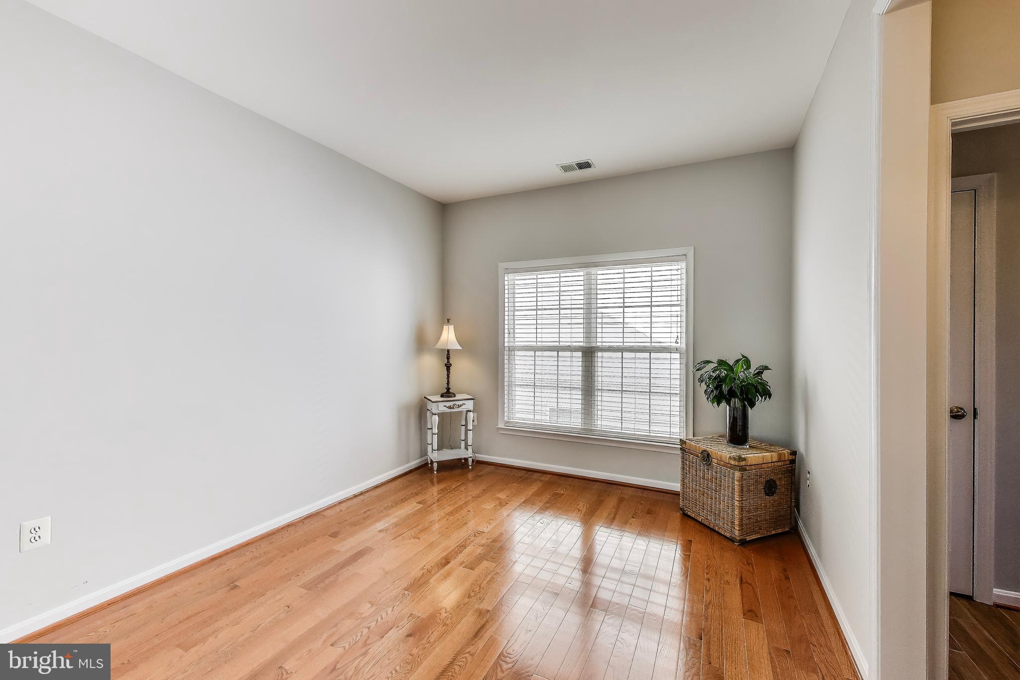 16180 Radburn Street Woodbridge, VA 22191 - Photo 32 of 54 a view of an empty room with a window