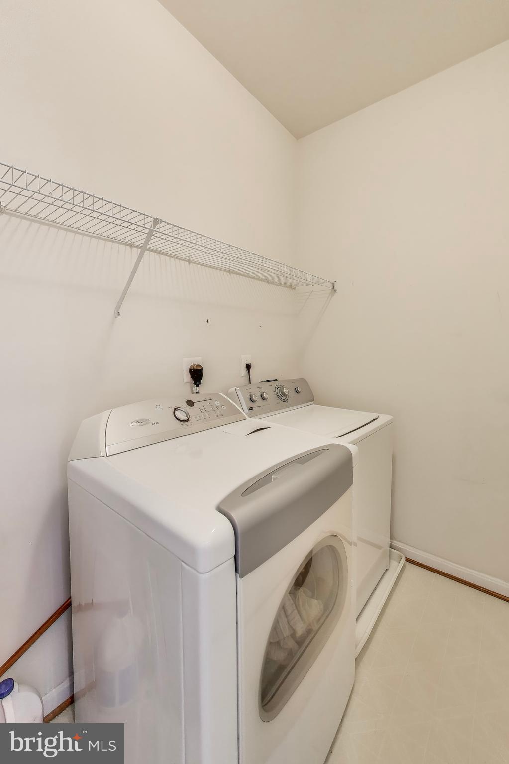 16180 Radburn Street Woodbridge, VA 22191 - Photo 40 of 54 a utility room with dryer and washer