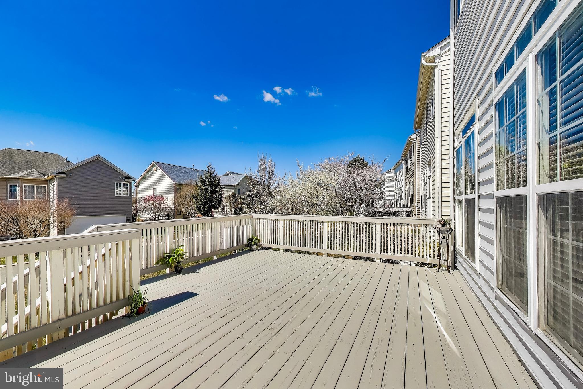 16180 Radburn Street Woodbridge, VA 22191 - Photo 44 of 54 a view of balcony with wooden floor and fence