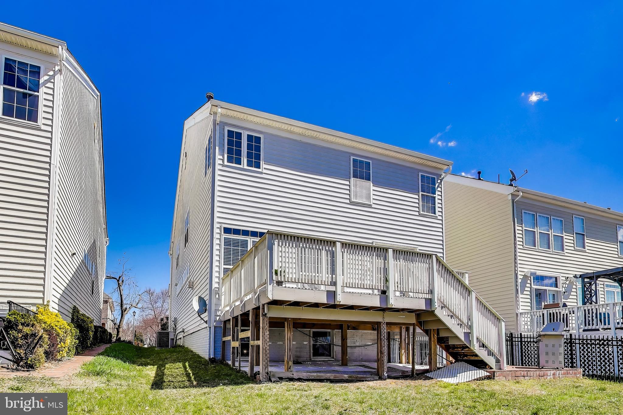 16180 Radburn Street Woodbridge, VA 22191 - Photo 47 of 54 a view of a house with a balcony