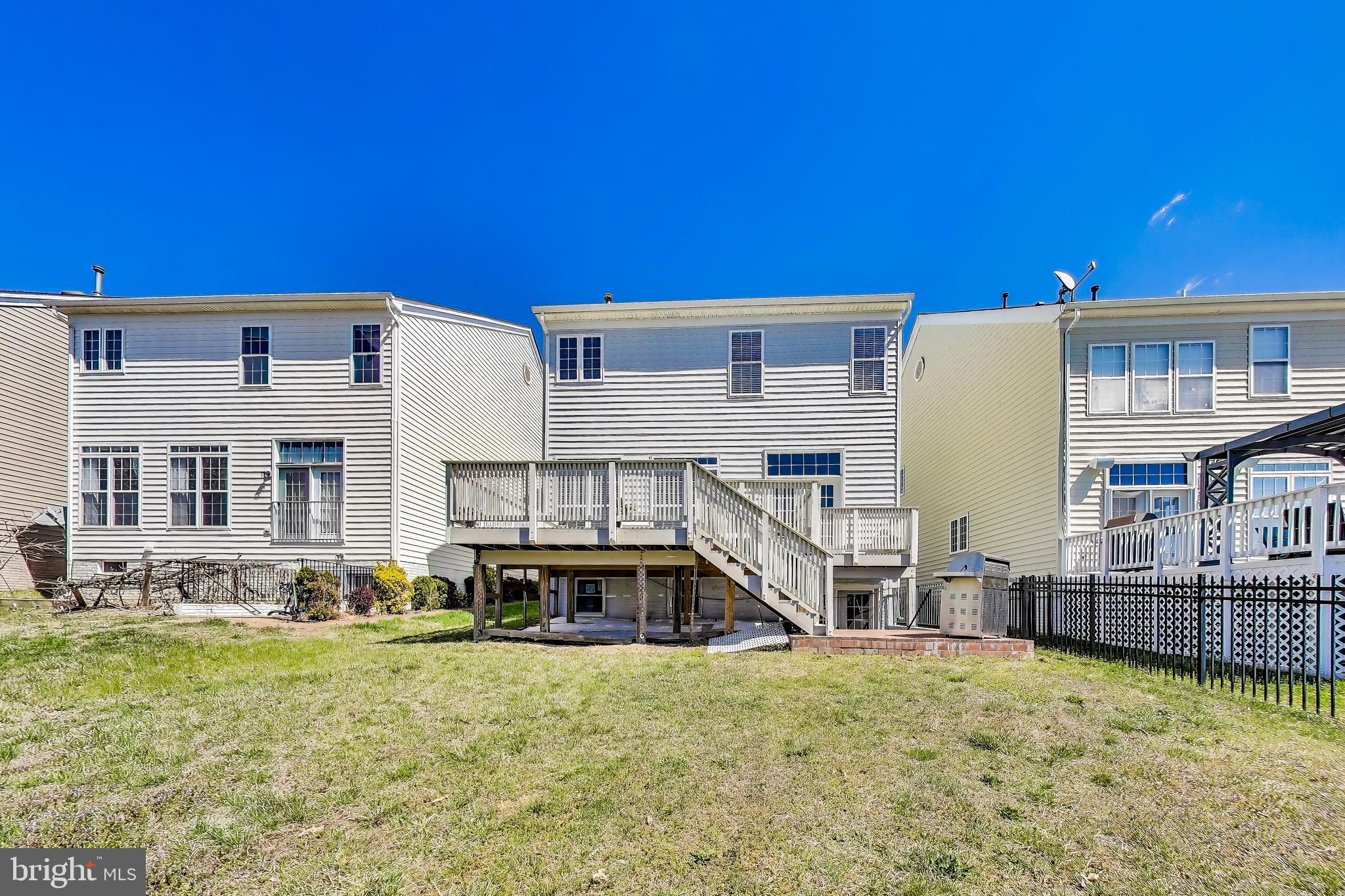 16180 Radburn Street Woodbridge, VA 22191 - Photo 51 of 54 a view of a house with roof deck