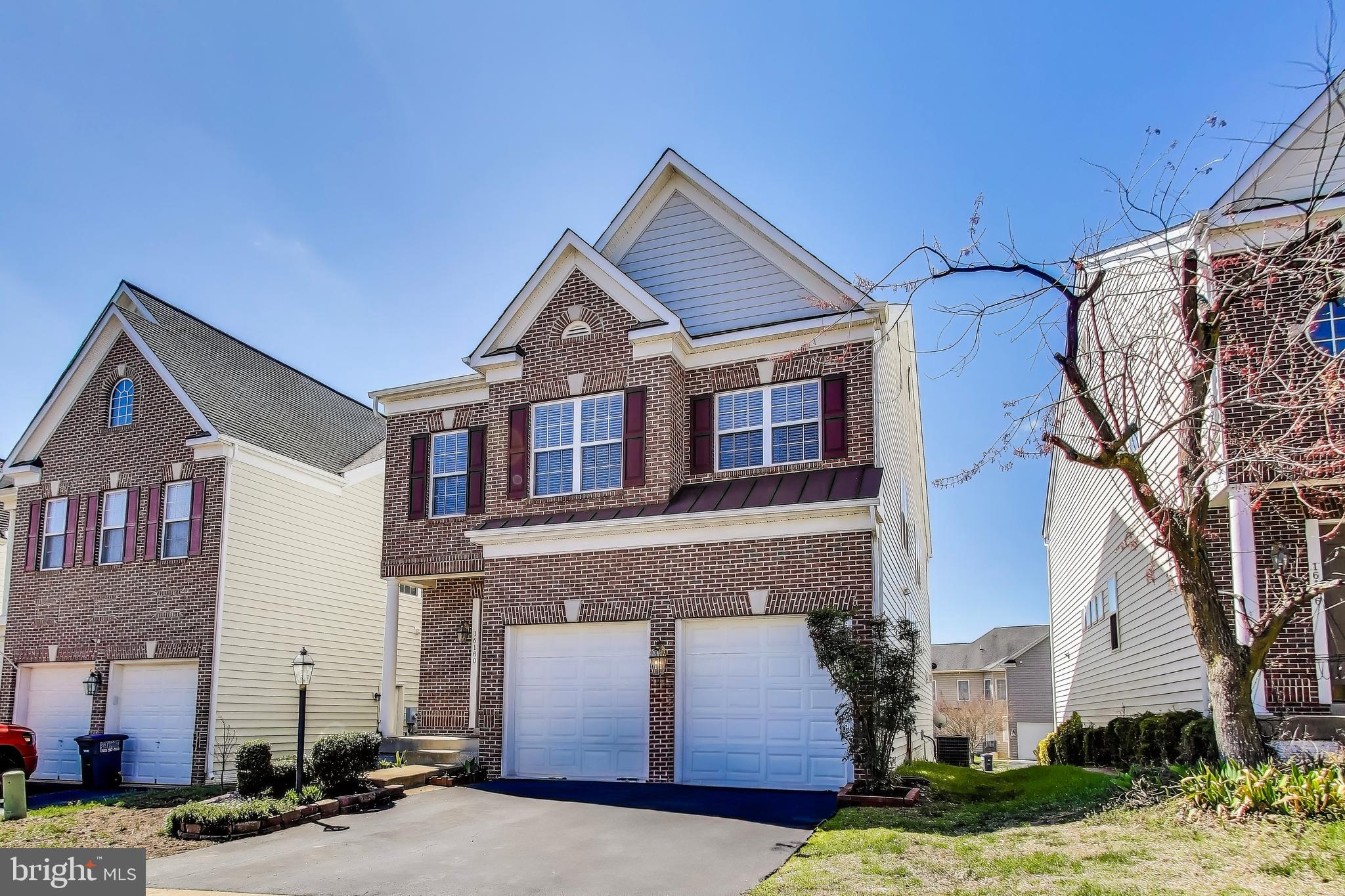 16180 Radburn Street Woodbridge, VA 22191 - Photo 53 of 54 a front view of a house with garden