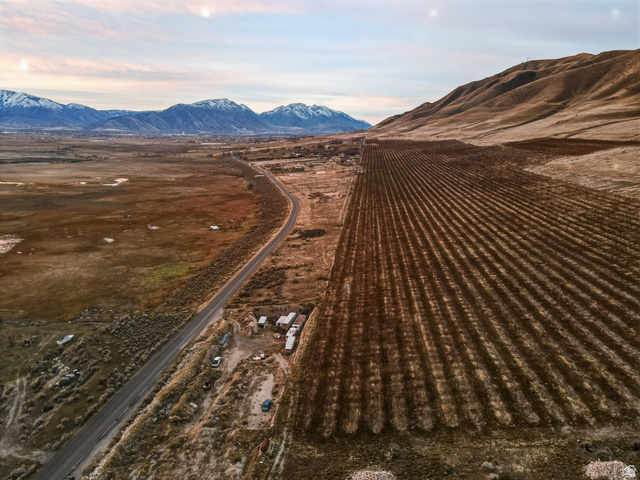 5952 South Lincoln Road Spanish Fork, UT 84660 - Photo 7 of 15 Aerial view of sparsely populated area with a mountainous background and extensive farmland