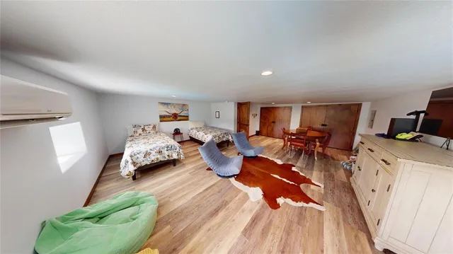 a bed room with furniture and a window