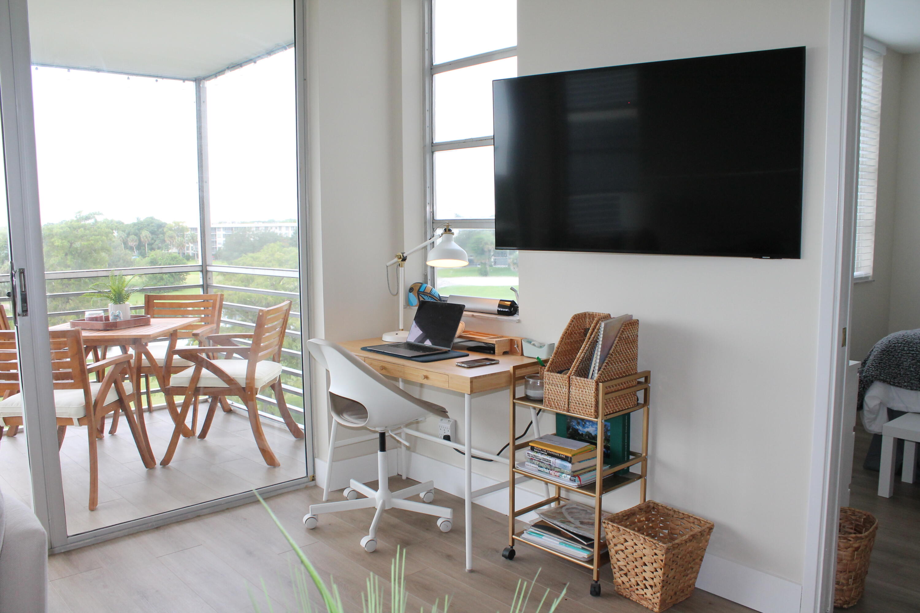 3520 Oaks Way, Unit 607 Pompano Beach, FL 33069 - Photo 12 of 46 a view of a dining room with furniture window and outside view