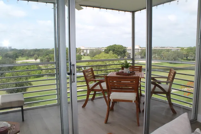 a view of a balcony with city view