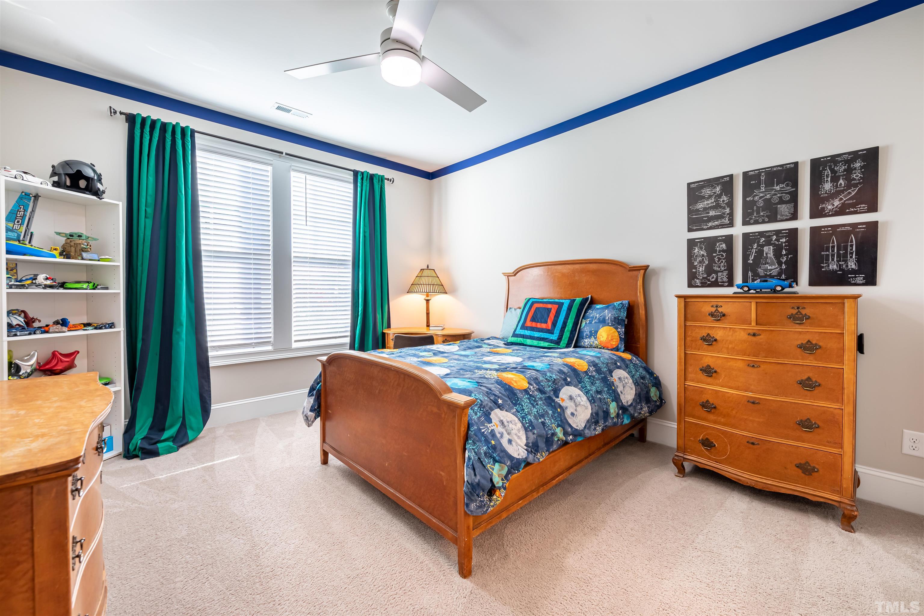 456 Adkins Ridge Road Rolesville, NC 27571 - Photo 18 of 38 a bedroom with a bed and a window