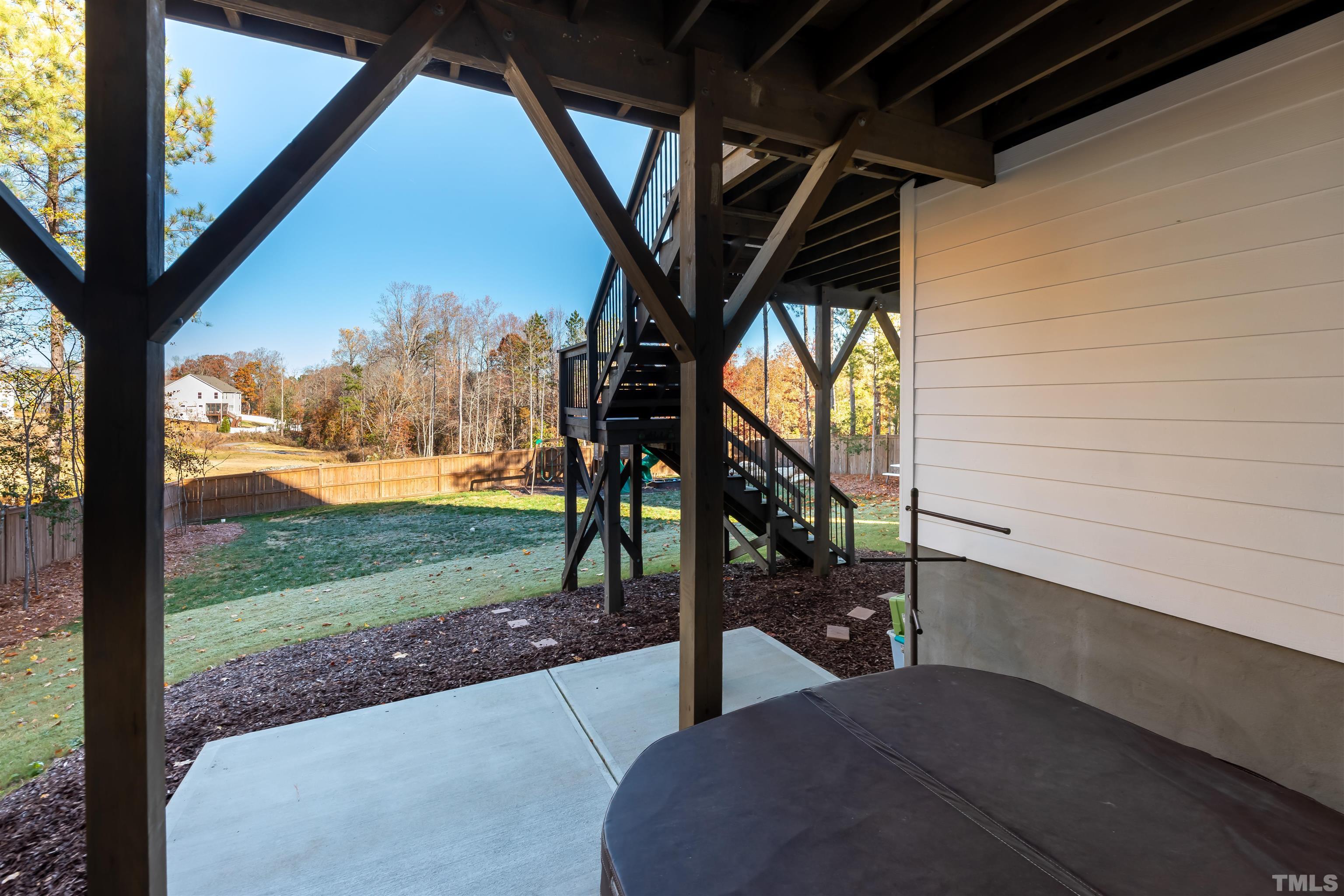 456 Adkins Ridge Road Rolesville, NC 27571 - Photo 34 of 38 a view of a porch with a backyard