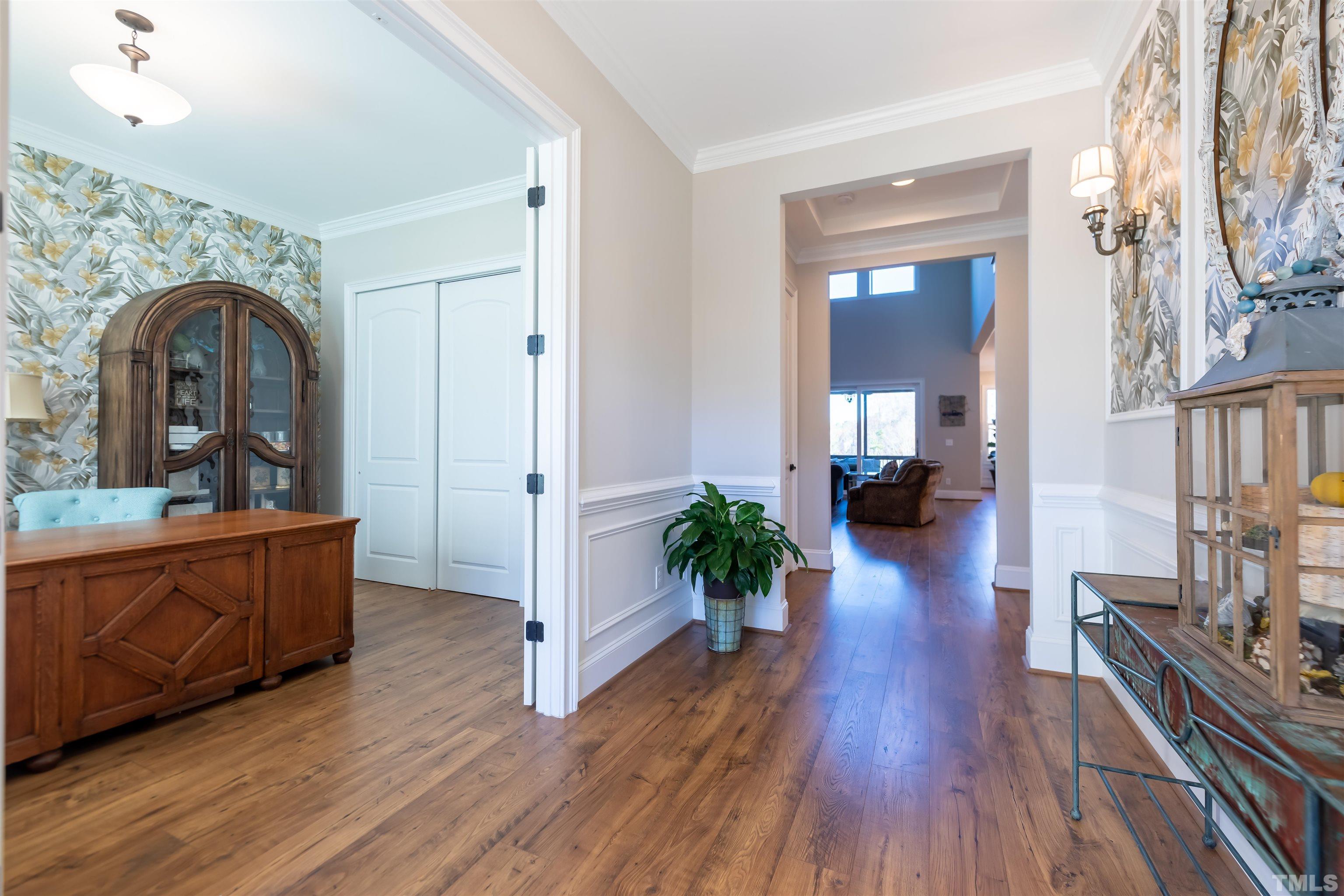 456 Adkins Ridge Road Rolesville, NC 27571 - Photo 8 of 38 a living room with furniture and a wooden floor