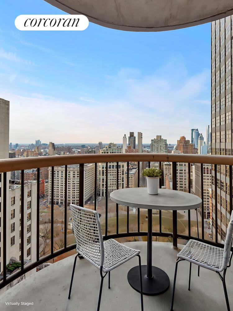 45 East 25th Street, Unit 37A Manhattan, NY 10010 - Photo 3 of 13 a view of a chairs and table in the roof deck