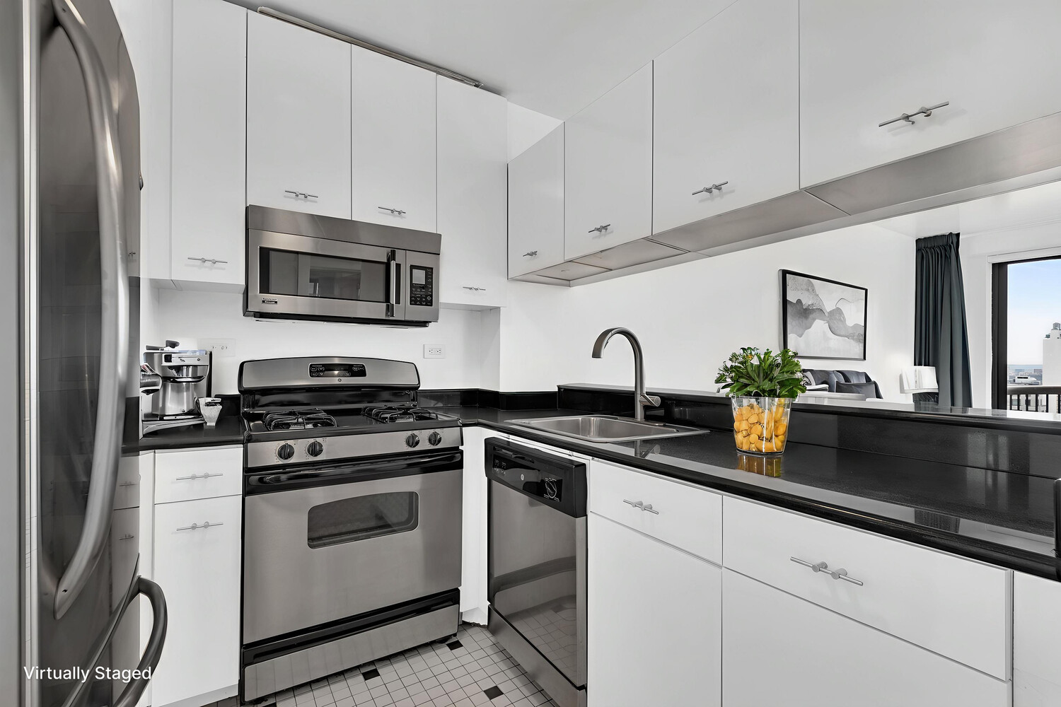 45 East 25th Street, Unit 37A Manhattan, NY 10010 - Photo 6 of 13 a kitchen with appliances a sink and cabinets