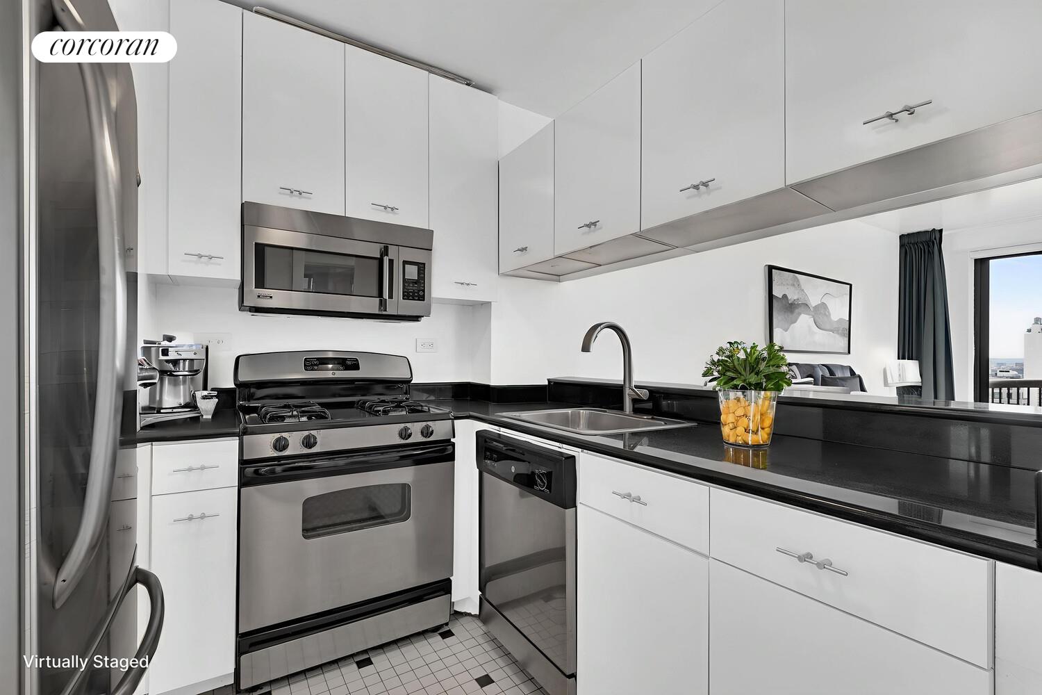 45 East 25th Street, Unit 37A Manhattan, NY 10010 - Photo 7 of 13 a kitchen with appliances a sink and cabinets