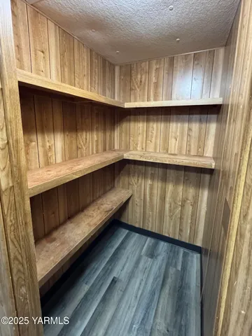 a view of kitchen with wooden floor