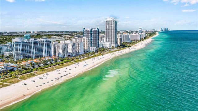 a view of a city and a lake