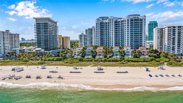 a view of a city with tall buildings