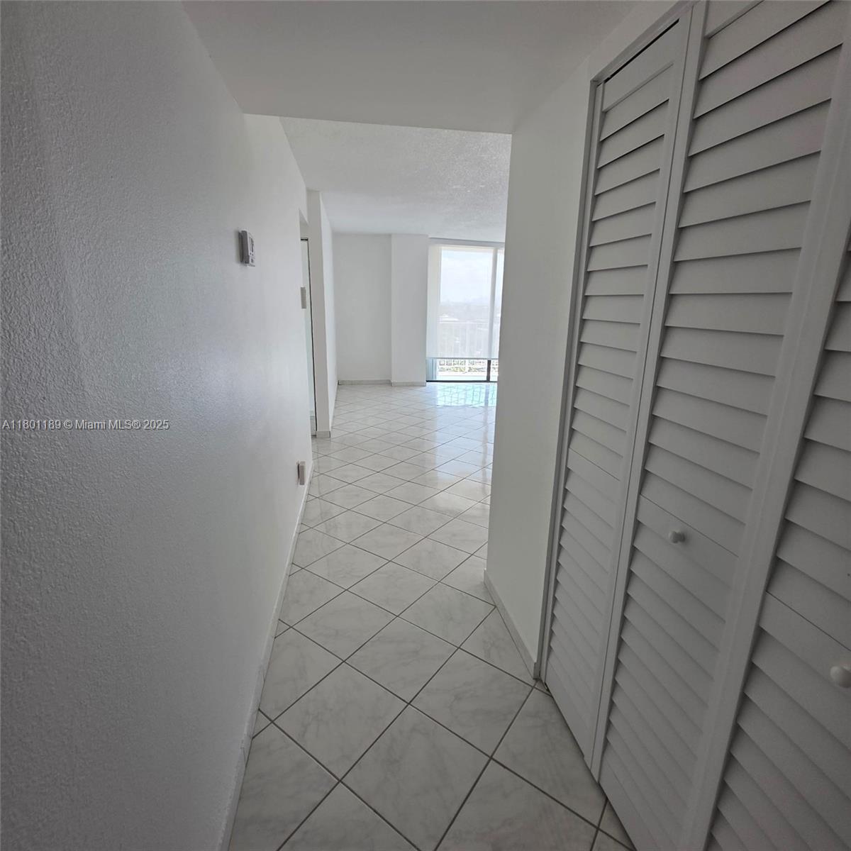 2350 Northeast 135th Street, Unit 1010 North Miami, FL 33181 - Photo 19 of 23 a view of a room