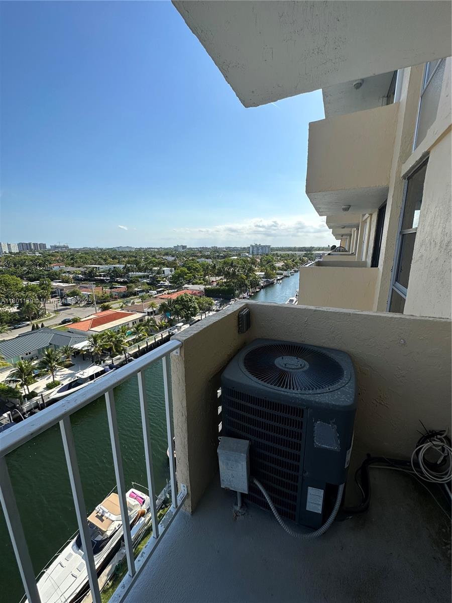 2350 Northeast 135th Street, Unit 1010 North Miami, FL 33181 - Photo 2 of 23 a view of balcony with furniture