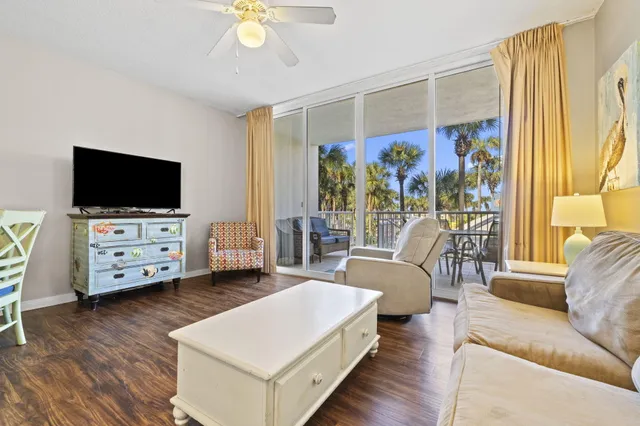 a kitchen with stainless steel appliances granite countertop a refrigerator and a stove