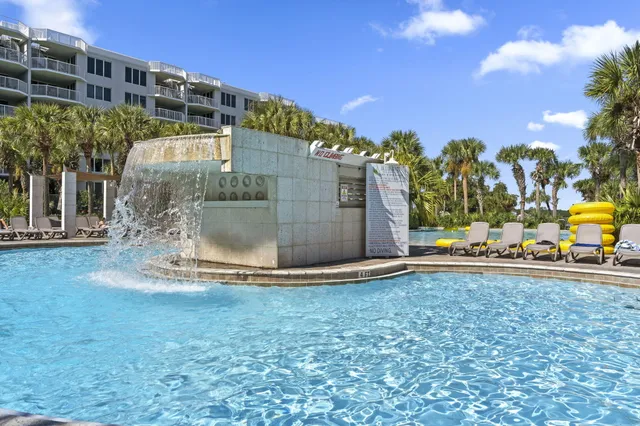 an aerial view of a building with outdoor space