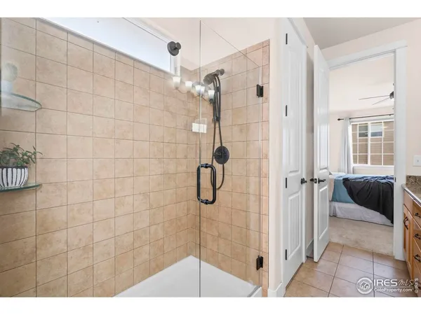 a bedroom with a bed and a table in it