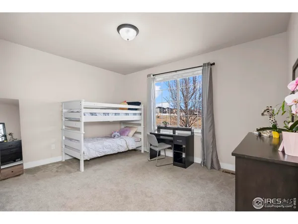 a kitchen with stainless steel appliances granite countertop a sink a stove and cabinets