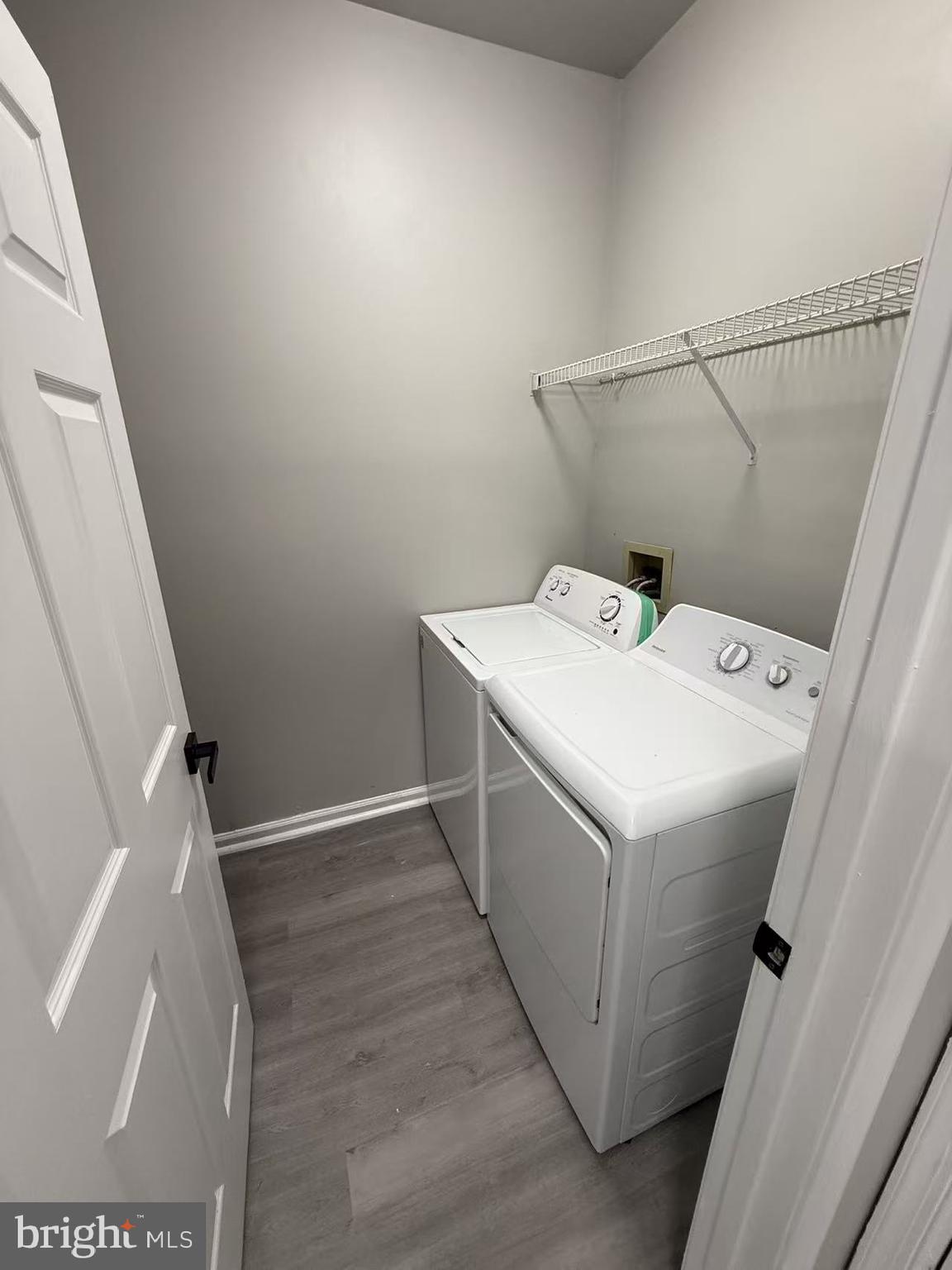 4400 Silverbrook Lane, Unit F003 Owings Mills, MD 21117 - Photo 13 of 17 a utility room with dryer and washer