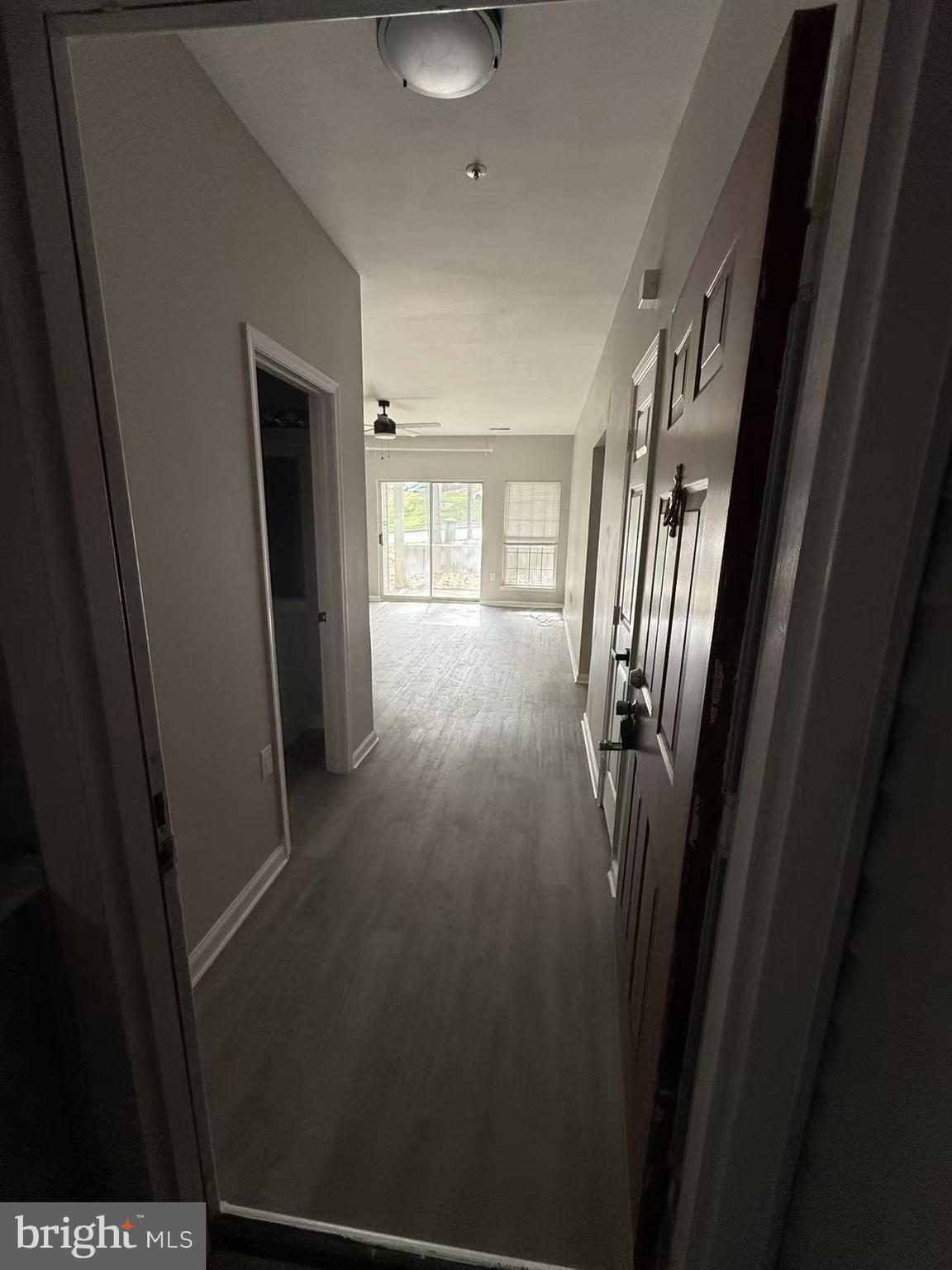 4400 Silverbrook Lane, Unit F003 Owings Mills, MD 21117 - Photo 10 of 17 a view of gallery with wooden floor